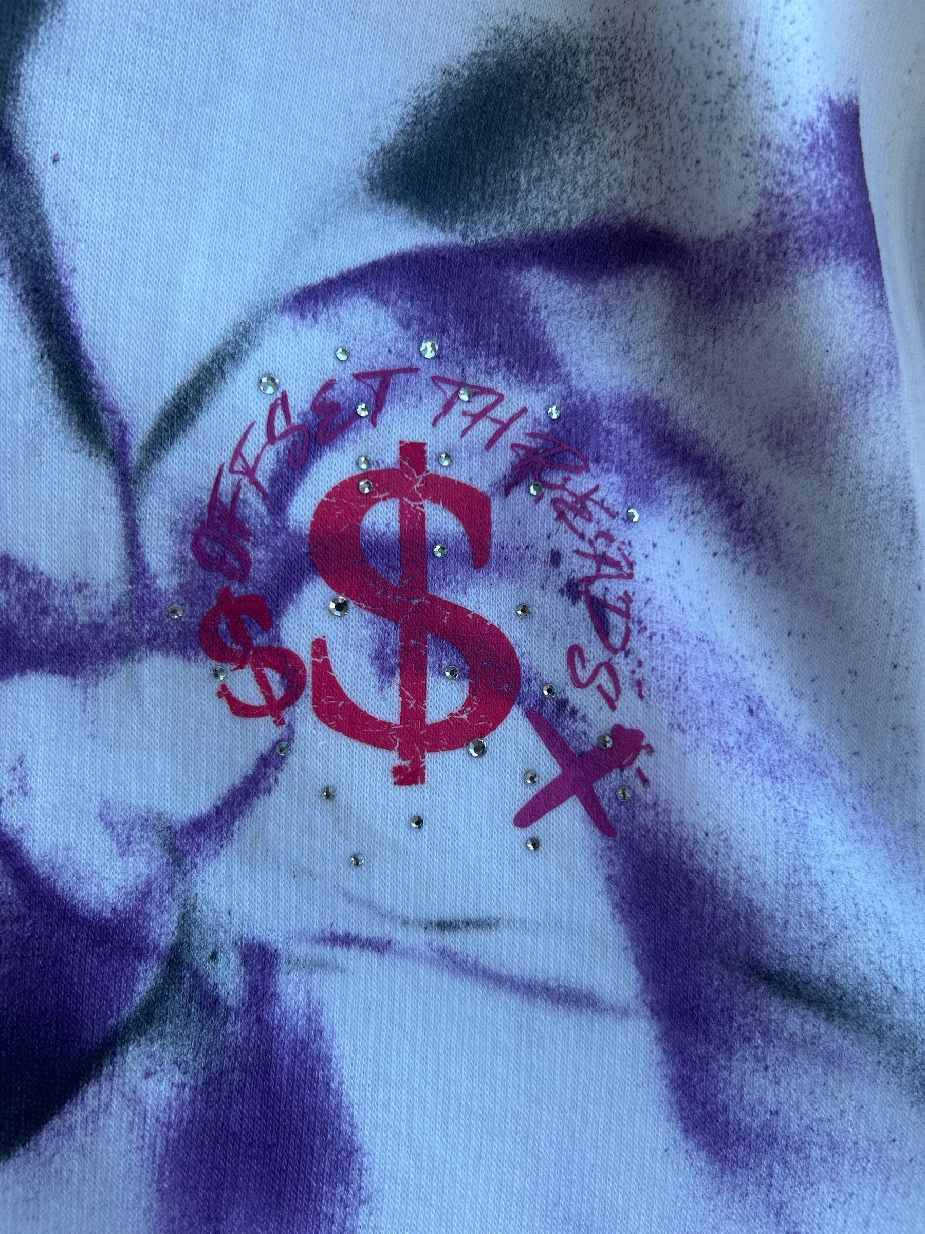 Her offset threads hustle more hoodie